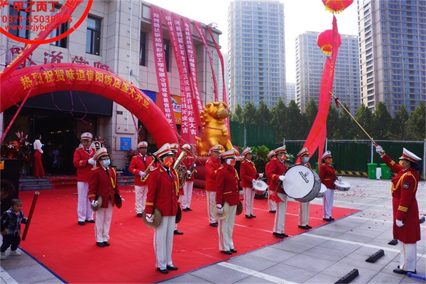 河南郑州开业庆典典礼剪彩仪式礼仪策划公司 彩虹门 军乐队 饭店开业剪彩用品舞狮点睛演出.jpg